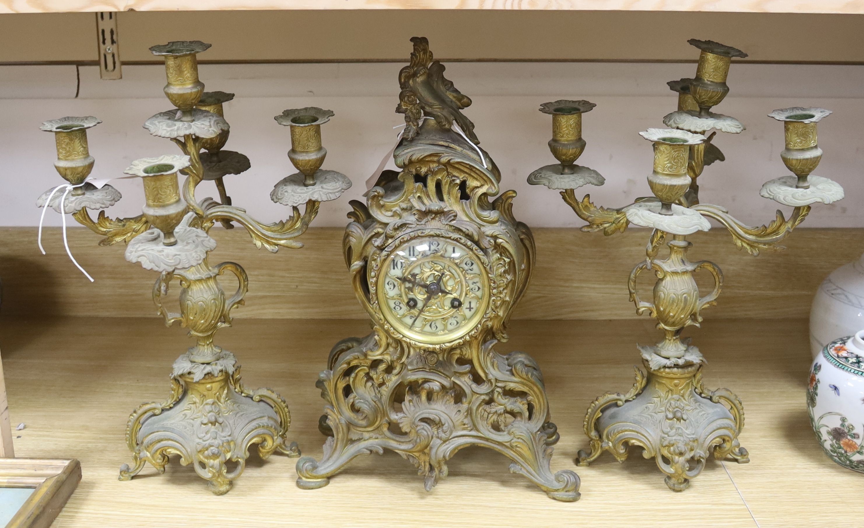 A 19th century French ormolu clock garniture, height 40cm